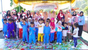 Peringati Hari Anak Nasional Ke 39 DWP Bapenda Kunjungi TK Sangaji Jiko Malofo